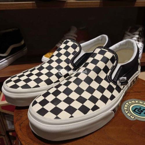 vans black white checkered slip on