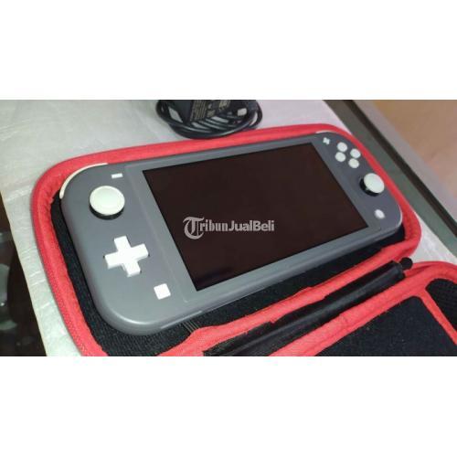 Konsol Nintendo Switch Lite + Mcard 128GB + Game Ori Bekas Mulus Normal - Makassar