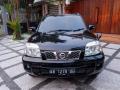Mobil Nissan Xtrail Type ST 2.5 AT 2005 Hitam Second Mesin Kering - Sleman